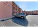 Exterior shot of a building with a parked car and well-maintained parking lot at 4186 Heron Way # B-219, Bradenton, FL 34205