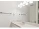 Bathroom vanity with quartz countertops, vanity mirror, lighting, and chrome hardware at 4225 Overture Cir, Bradenton, FL 34209