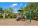 Community playground featuring climbing structures and slides at 4225 Overture Cir, Bradenton, FL 34209