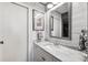 Bright bathroom featuring modern finishes, sleek vanity, and framed mirror at 4410 Fairways Blvd # 605, Bradenton, FL 34209
