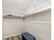 Walk-in closet with hanging racks and storage space at 4885 1St Ne St # 308, St Petersburg, FL 33703