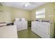 On-site laundry room provides residents with convenient washers and dryers at 4885 1St Ne St # 308, St Petersburg, FL 33703