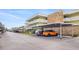 Covered parking with assigned parking spaces at 4885 1St Ne St # 308, St Petersburg, FL 33703