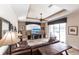 Bright living room with a large sliding glass door to a patio at 5391 90Th Avenue E Cir, Parrish, FL 34219