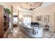Spacious living room with a ceiling fan and tile flooring at 5391 90Th Avenue E Cir, Parrish, FL 34219