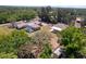 Aerial view of the property features a main house, pool, and garage at 6217 Goldfinch St, Sarasota, FL 34241