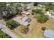 Aerial view of estate with pool, manicured grounds, and detached garage with covered parking at 6217 Goldfinch St, Sarasota, FL 34241