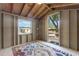 The interior view of the playhouse showcases bare framing with a colorful area rug at 6217 Goldfinch St, Sarasota, FL 34241