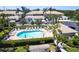 Enjoy the community pool and amenities at this inviting condominium complex with lush landscaping at 6334 Grand Oak Cir # 202, Bradenton, FL 34203