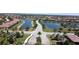 Beautiful aerial view of the residential community featuring homes surrounding lakes and manicured landscaping at 6740 Willowshire Way, Bradenton, FL 34212
