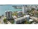 Gorgeous aerial view of luxury high rise condominiums with lush landscaping and waterfront views at 707 S Gulfstream Ave # 501, Sarasota, FL 34236