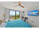 Bedroom featuring a ceiling fan, a waterfront view and a smart tv for entertainment at 707 S Gulfstream Ave # 501, Sarasota, FL 34236