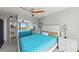Spacious bedroom with a view of the water and mirrored sliding door, enhancing the sense of space at 707 S Gulfstream Ave # 501, Sarasota, FL 34236