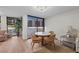 A naturally lit dining area boasts views of the pool outside the window at 707 S Gulfstream Ave # 501, Sarasota, FL 34236