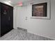 Hallway showing the door and artwork with a fire dept. valve at 707 S Gulfstream Ave # 501, Sarasota, FL 34236