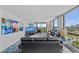 A well lit living room with modern décor and amazing views at 707 S Gulfstream Ave # 501, Sarasota, FL 34236