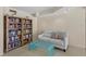Cozy living room area with a comfy sofa, stylish coffee table, and a filled bookcase at 707 S Gulfstream Ave # 501, Sarasota, FL 34236