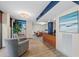 Bright lounge area featuring comfortable seating, sleek wooden breakfast bar, and ample natural light at 707 S Gulfstream Ave # 501, Sarasota, FL 34236