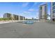 Rooftop pool area with stunning views of surrounding buildings at 707 S Gulfstream Ave # 501, Sarasota, FL 34236