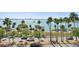 Stunning water view showing palm trees, a four lane road, and multiple sailboats at 707 S Gulfstream Ave # 501, Sarasota, FL 34236