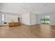 Spacious kitchen boasts hardwood floors, sleek cabinetry, and modern appliances at 7200 Chameleon Way, Sarasota, FL 34241