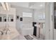 Bright bathroom features a soaking tub, and a glass enclosed shower at 8718 Grey Oaks Ave, Sarasota, FL 34238