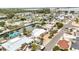 Residential waterfront homes featuring lush landscaping, private docks, and convenient street access at 10308 Kingfisher W Rd, Bradenton, FL 34209