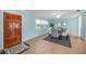 Bright dining room with light blue walls, tile floors, and seating for six at 10308 Kingfisher W Rd, Bradenton, FL 34209
