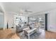 Open-concept living room flowing into the kitchen, with stylish decor and plenty of natural light at 10308 Kingfisher W Rd, Bradenton, FL 34209