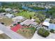 Aerial view of a beautifully landscaped property, showcasing its prime location at 1156 Lemon Bay Dr, Venice, FL 34293
