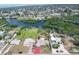 Expansive aerial view of the property showcasing its waterfront location and community at 1156 Lemon Bay Dr, Venice, FL 34293