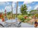 Beautifully landscaped backyard with patio area, perfect for enjoying the scenic surroundings at 1156 Lemon Bay Dr, Venice, FL 34293