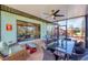 Relaxing screened patio features comfortable seating and dining area, ideal for entertaining at 1156 Lemon Bay Dr, Venice, FL 34293