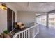 Balcony with comfortable seating and views of the surrounding area at 1280 Dolphin Bay Way # 503, Sarasota, FL 34242