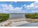 Private beach access with views of the waterway at 1280 Dolphin Bay Way # 503, Sarasota, FL 34242