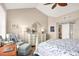 Sun-lit bedroom with hardwood floors, and a large window offering panoramic water views at 1280 Dolphin Bay Way # 503, Sarasota, FL 34242