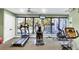 Community gym offering a treadmill, elliptical, and other exercise equipment at 1280 Dolphin Bay Way # 503, Sarasota, FL 34242