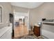 Home office that leads to an open kitchen with a view of the island at 1280 Dolphin Bay Way # 503, Sarasota, FL 34242