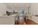 Bright dining area with a breakfast bar, pendant lighting, and access to the lanai at 12830 24Th Street E Cir, Parrish, FL 34219