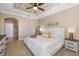 Bedroom featuring a ceiling fan, a neutral color palette, and tile flooring in the entry way at 141 Bella Vista Ter # 34D, Nokomis, FL 34275