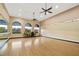 Spacious studio with hardwood floors, high ceilings, ceiling fans, and large windows for a bright and airy atmosphere at 141 Bella Vista Ter # 34D, Nokomis, FL 34275