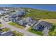 An expansive aerial view of upscale homes on the water with meticulous landscaping at 1613 4Th E St, Palmetto, FL 34221
