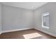 Bright bedroom with wood-look floors and ample natural light at 1613 4Th E St, Palmetto, FL 34221
