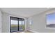 Bright bedroom with wood floors and water views from large windows at 1613 4Th E St, Palmetto, FL 34221