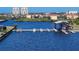 This waterfront view features a boat lift, providing convenience and protection for your vessel at 1613 4Th E St, Palmetto, FL 34221