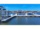 Multiple boat lifts, with various boats and sunny water views at 1613 4Th E St, Palmetto, FL 34221