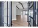 Spacious foyer with wood-look floors and expansive views to a screened pool beyond at 1613 4Th E St, Palmetto, FL 34221