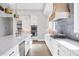 Beautiful kitchen showcasing a large island, stainless steel appliances, and custom cabinetry at 1613 4Th E St, Palmetto, FL 34221