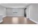 Large living room featuring wood floors and large windows with water views at 1613 4Th E St, Palmetto, FL 34221