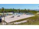 The outdoor patio is furnished with comfortable seating and tables, perfect for relaxing by the water at 1613 4Th E St, Palmetto, FL 34221